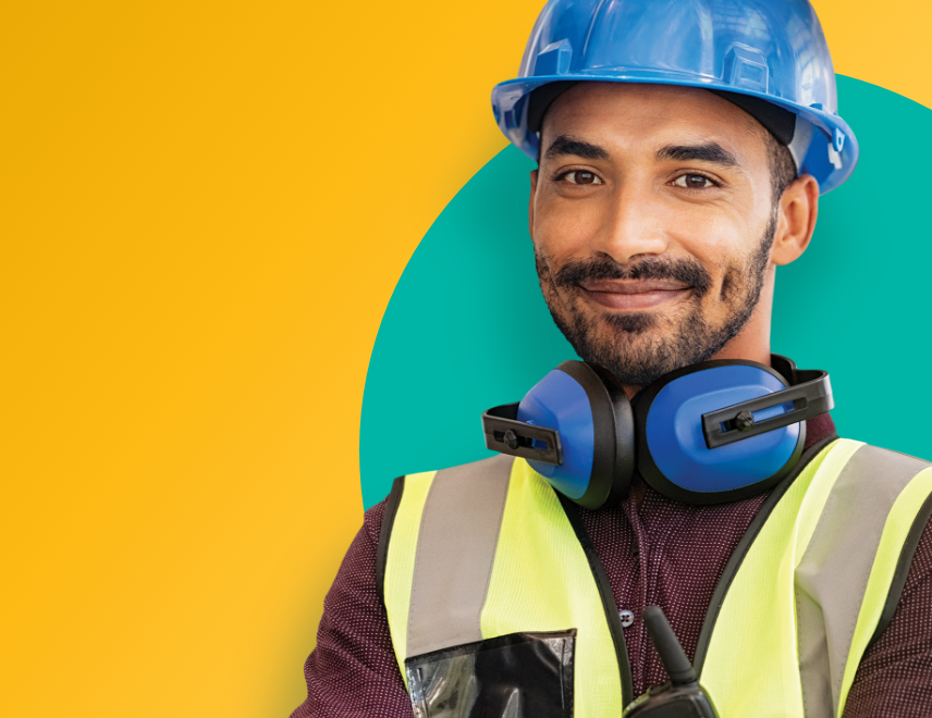 Smiling construction worker with a blue hard hat and blue earphones.