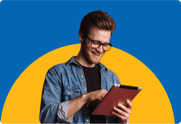 Young man managing personal finances using tablet.