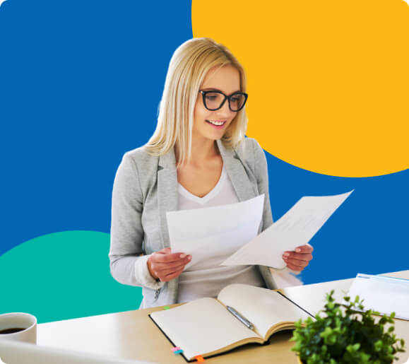 Woman reviewing financial documents.