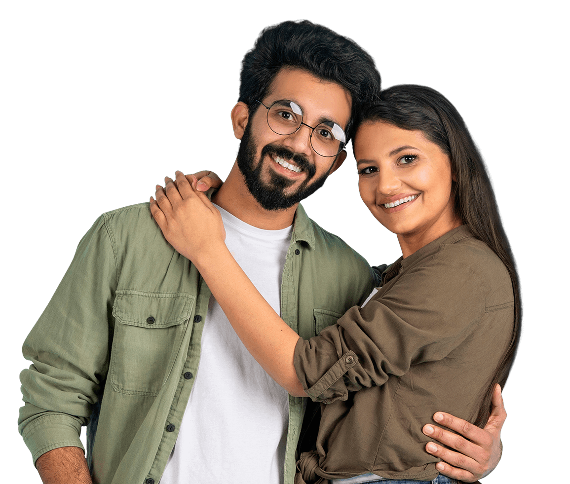 Smiling couple embracing.